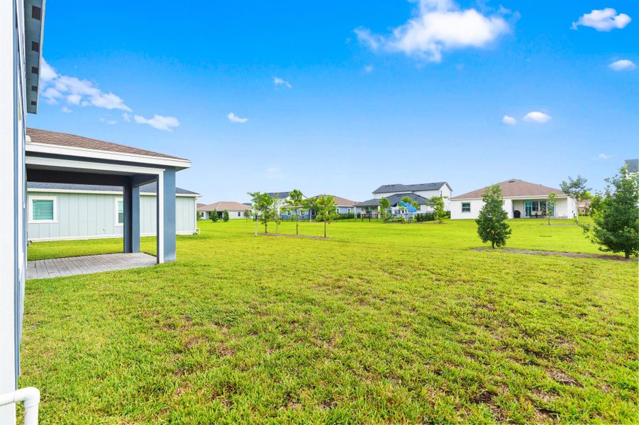 Front exterior of a new home in , Loxahatchee, FL, highlighting curb appeal (Image 1).