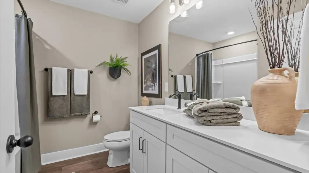 Furnished interior view inside a new home in Village at Midway, Anderson (Image 28).