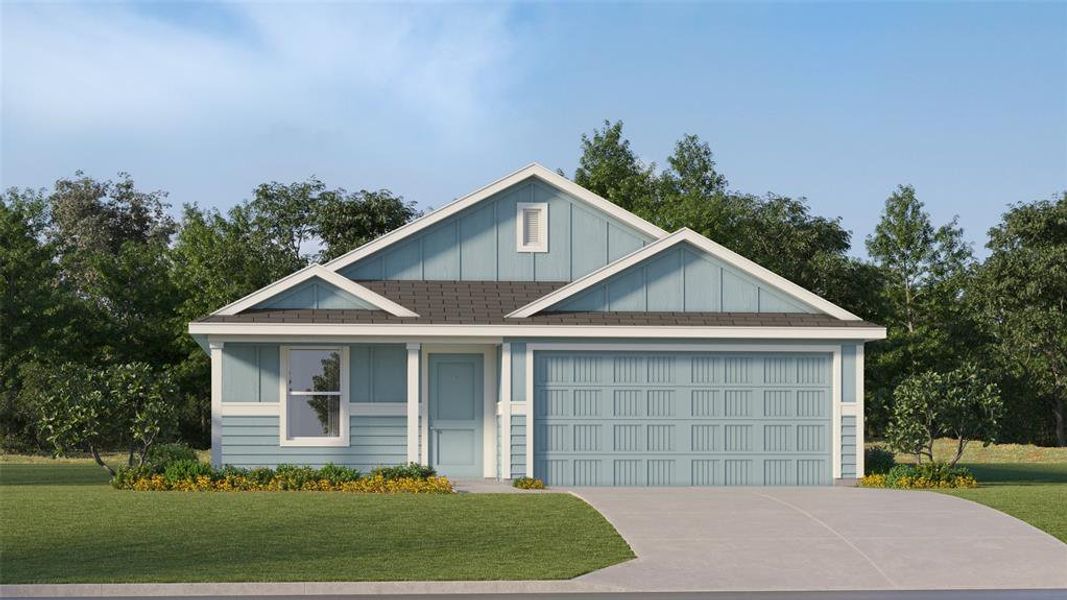 View of front of property with a front yard and a garage