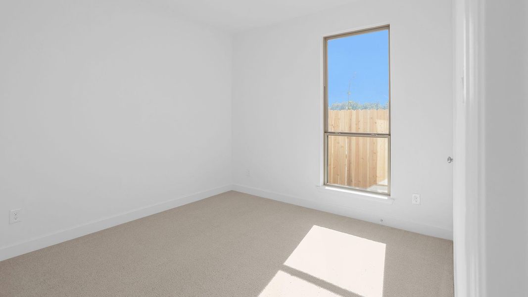 Spacious, unfurnished interior of a new home in Artavia 45', Conroe (Image 14).