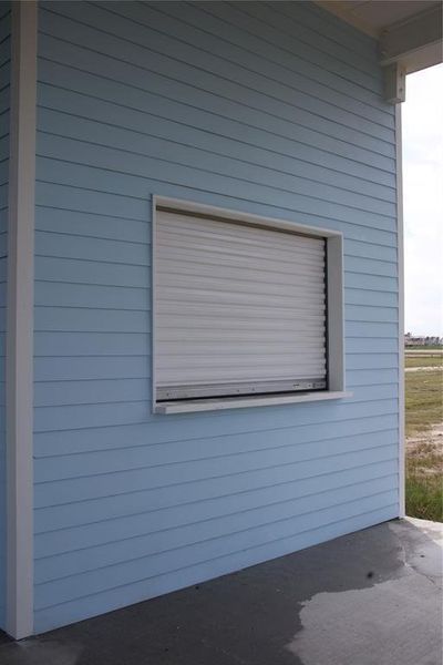 Front exterior of a new home in , Freeport, TX, highlighting curb appeal (Image 25). Front exterior of a new home in , Freeport, TX, highlighting curb appeal (Image 25).