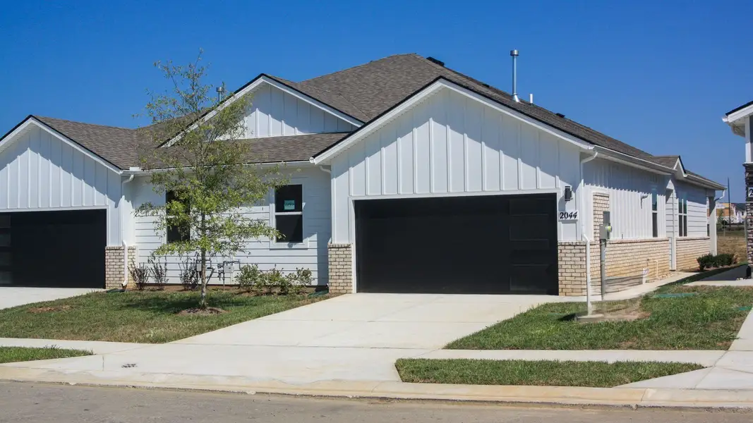 Front exterior of a new home in Nexus South, Gallatin, TN, highlighting curb appeal (Image 2).