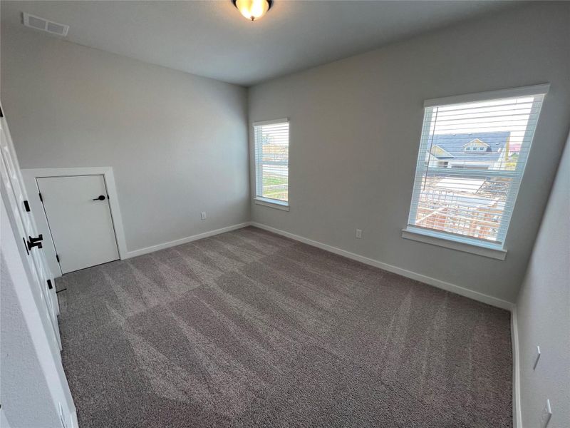 Spacious, unfurnished interior of a new home in Cascades at Onion Creek, Austin (Image 25).