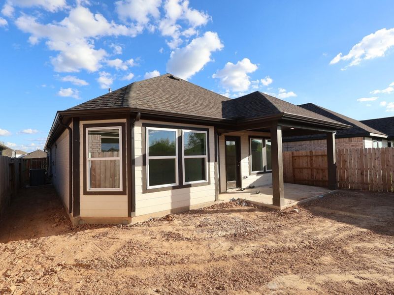 Exterior details and patio area of a home in Marvida, Cypress (Image 18).