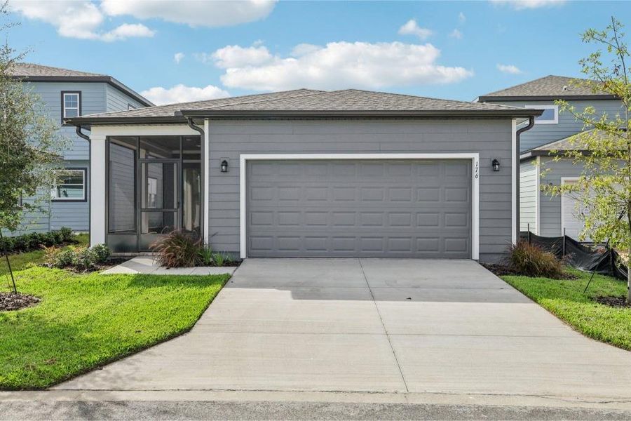 Front exterior of a home in the Northlake Classical community, located in Winter Garden, FL (Image 1).