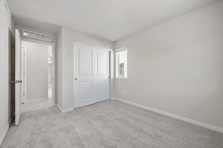 A room with white doors.