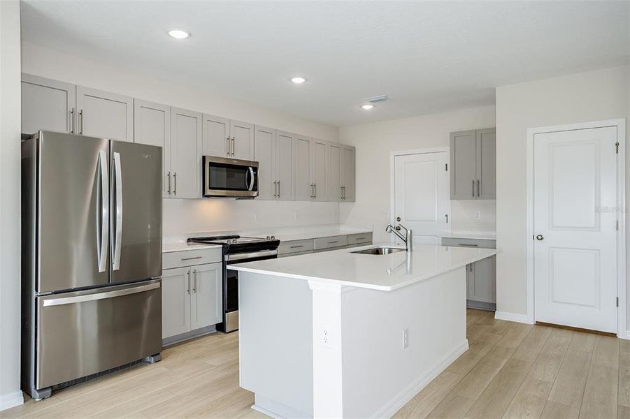 Furnished interior view inside a new home in Pasadena Ridge, Dade City (Image 3).