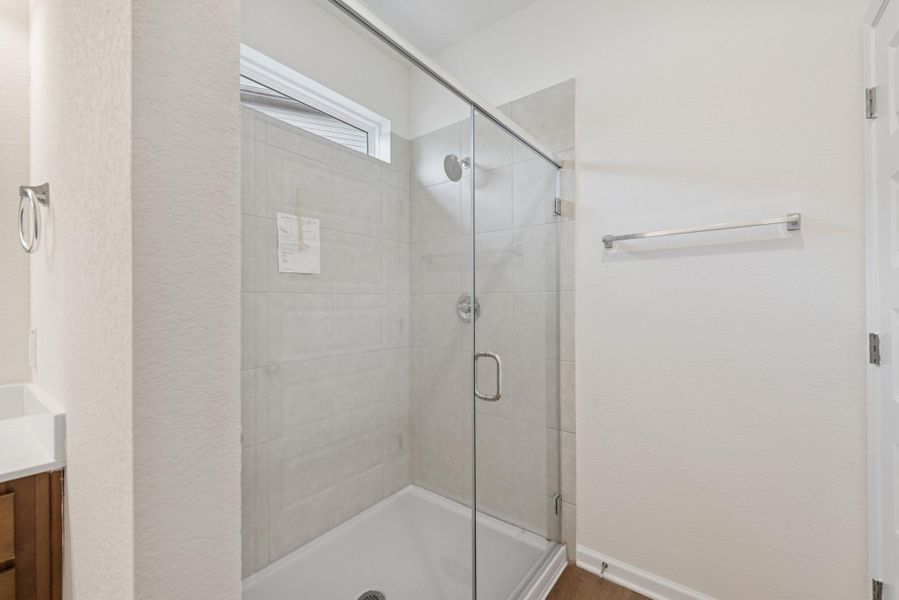 The Mockingbird II- Primary Bathroom with Walk-In Shower The Mockingbird II- Primary Bathroom with Walk-In Shower