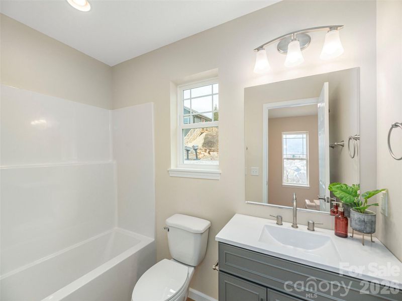 Furnished interior view inside a new home in , Waynesville (Image 8).