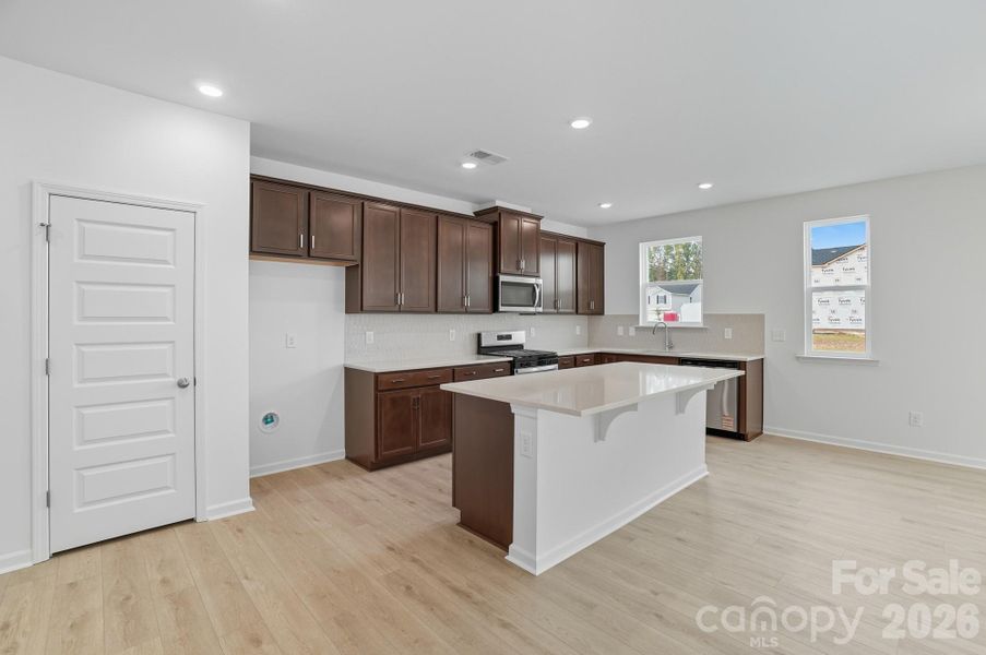 Furnished interior view inside a new home in Bellina, York (Image 7).