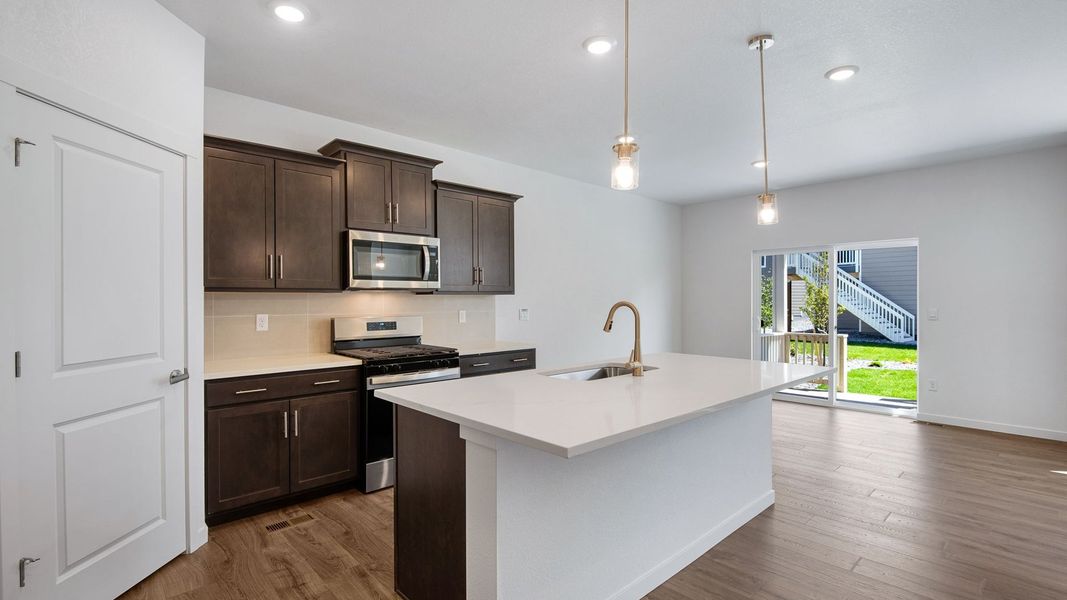 Furnished interior view inside a new home in Trails at Crowfoot, Parker (Image 8).