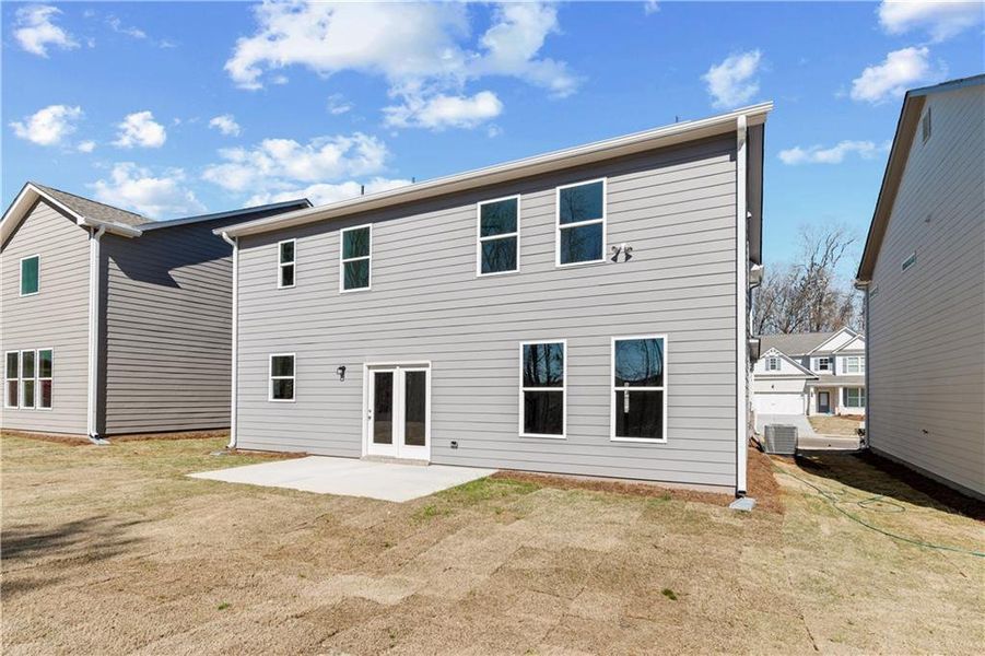 Exterior details and patio area of a home in Clark Farms, Flowery Branch (Image 2).