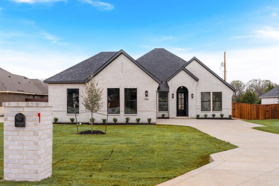 Front exterior of a new home in , Glenn Heights, TX, highlighting curb appeal (Image 23).