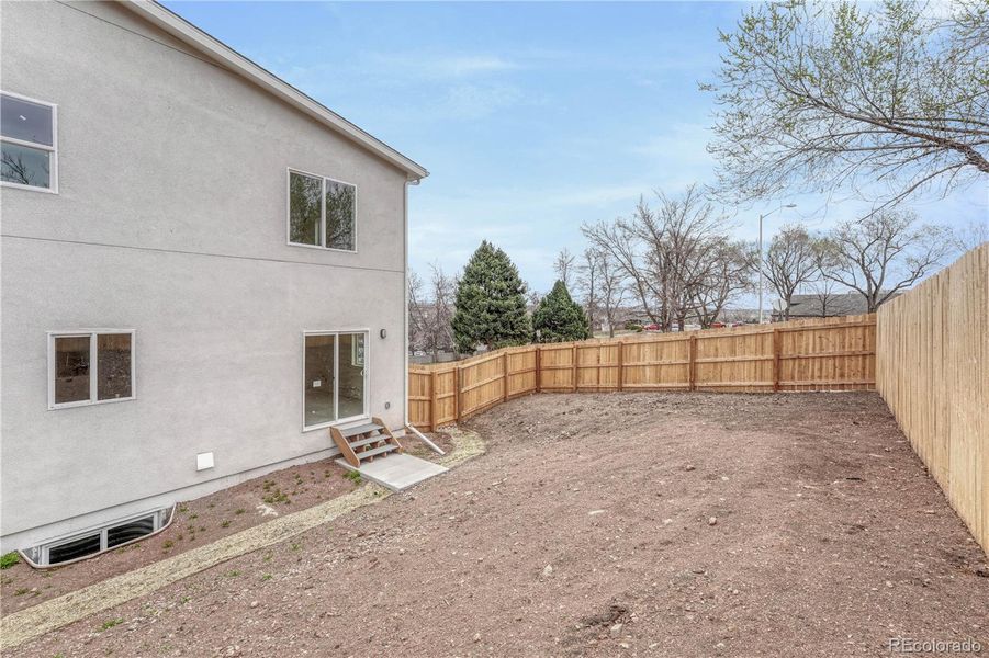 Front exterior of a new home in , Colorado Springs, CO, highlighting curb appeal (Image 18). Front exterior of a new home in , Colorado Springs, CO, highlighting curb appeal (Image 18).