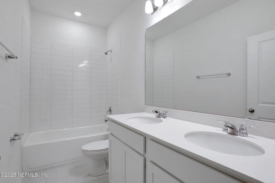 Furnished interior view inside a new home in Brook Forest - Townhomes, St. Augustine (Image 10).