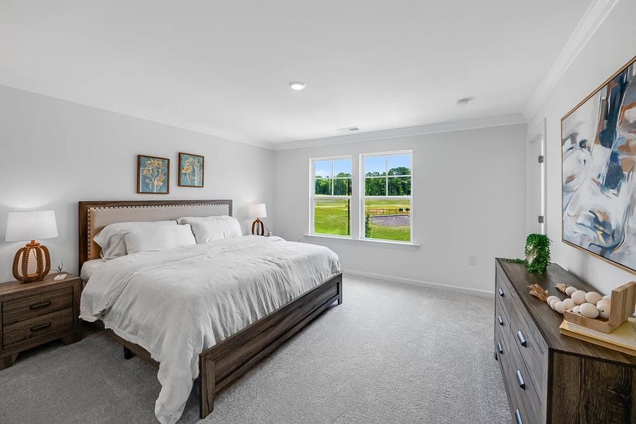 Representative furnished interior of a home built from the Magnolia by Taylor Morrison in Forestville Station, Wake Forest (Image 26).