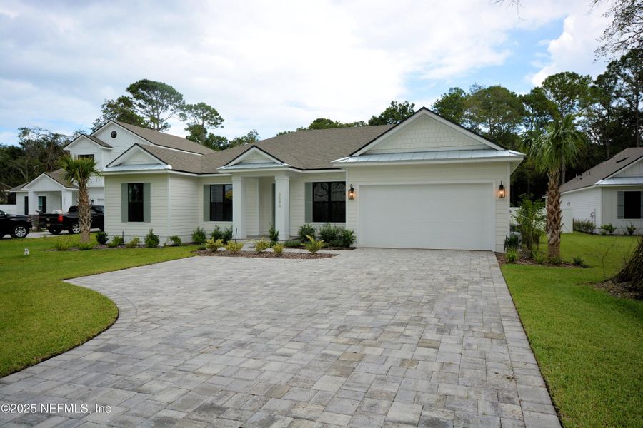 Front exterior of a new home in , Fernandina Beach, FL, highlighting curb appeal (Image 23).