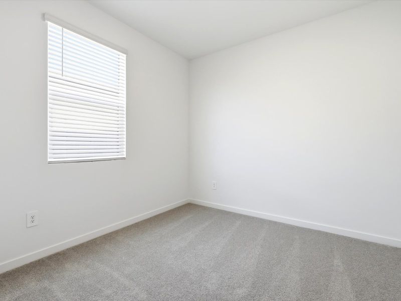Spacious, unfurnished interior of a new home in Rancho Mirage Estate Series, Maricopa (Image 10).