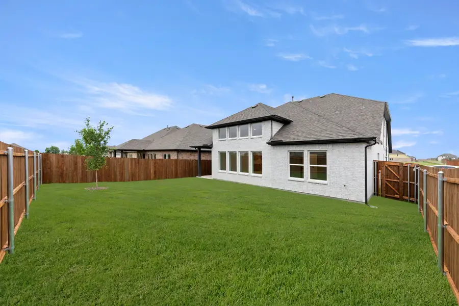 Representative exterior details of a home built from the Honor by Rockwell Homes in Creekside, Royse City (Image 43).