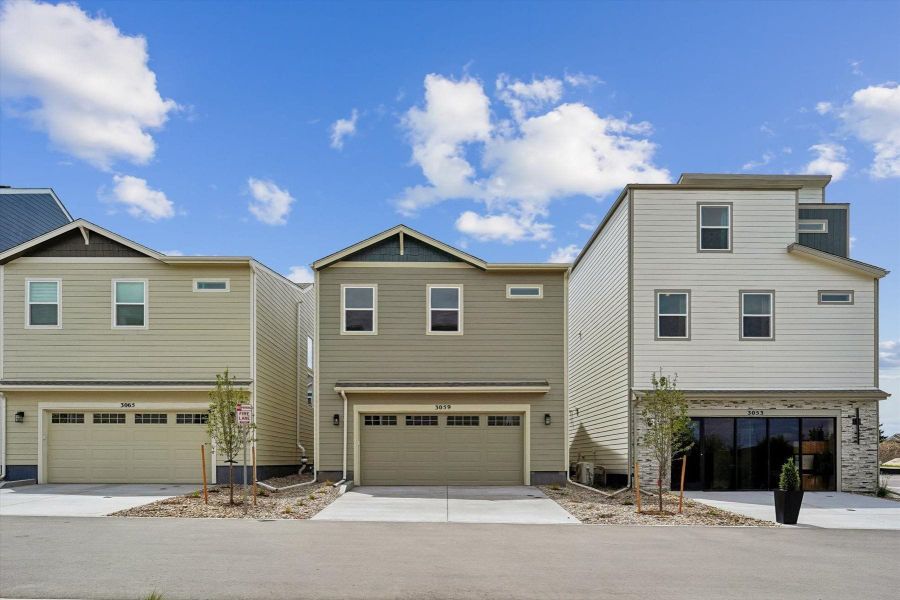 Front exterior of a new home in Pony Park, Colorado Springs, CO, highlighting curb appeal (Image 20).