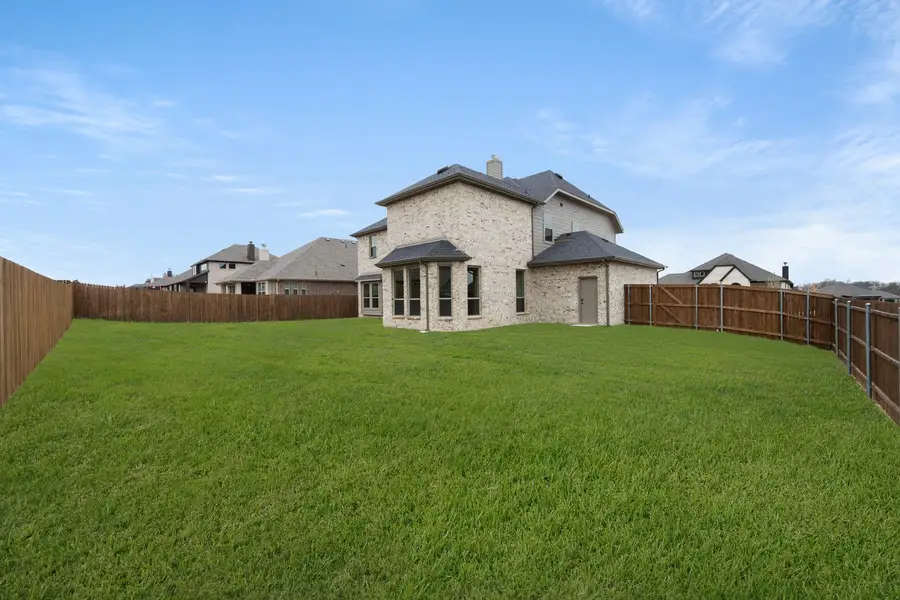 Exterior details and patio area of a home in Hayes Crossing, Midlothian (Image 3). Exterior details and patio area of a home in Hayes Crossing, Midlothian (Image 3).