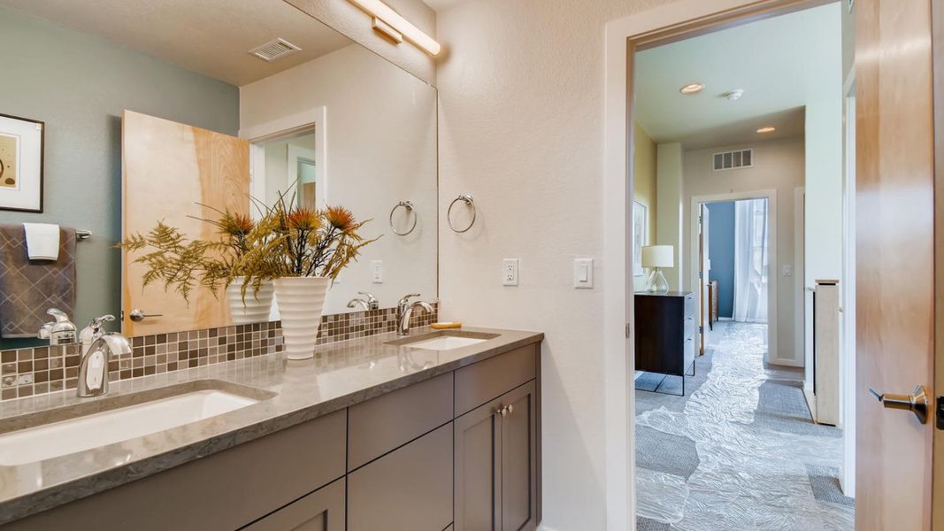 Representative furnished interior of a home built from the 2100 2-Story Front Load by Markel Homes in West Grange, Longmont (Image 9).