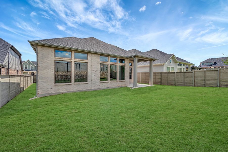 Exterior details and patio area of a home in Treeline, Justin (Image 3). Exterior details and patio area of a home in Treeline, Justin (Image 3).