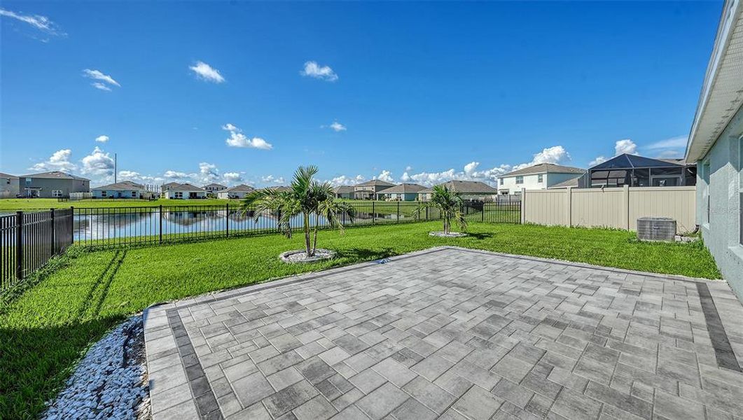 Exterior details and patio area of a home in Bella Lago, Parrish (Image 3). Exterior details and patio area of a home in Bella Lago, Parrish (Image 3).