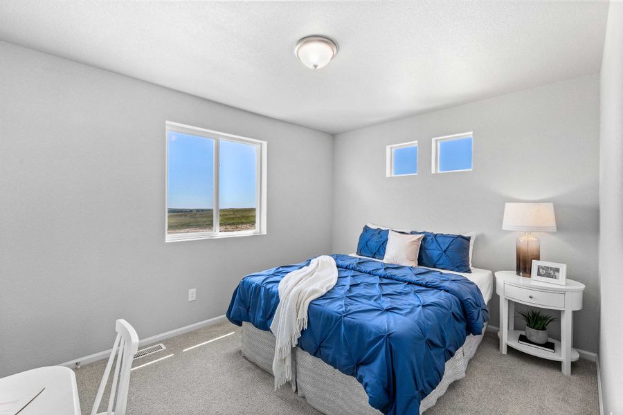 Furnished interior view inside a new home in Banning Lewis Ranch - New Homes Colorado Springs, Colorado Springs (Image 28). Furnished interior view inside a new home in Banning Lewis Ranch - New Homes Colorado Springs, Colorado Springs (Image 28).