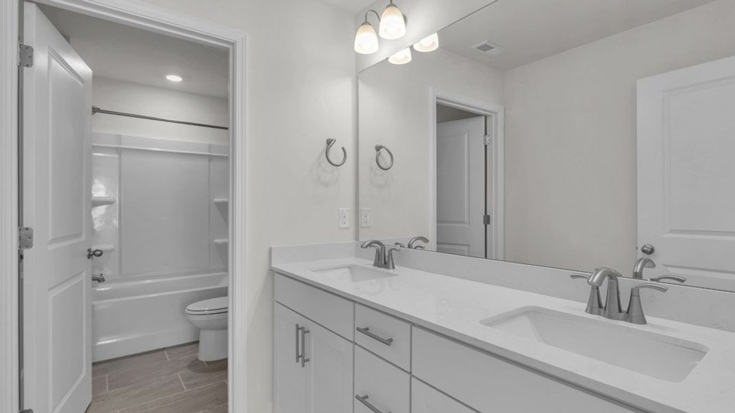 Furnished interior view inside a new home in Eagle Creek, Fuquay Varina (Image 11).
