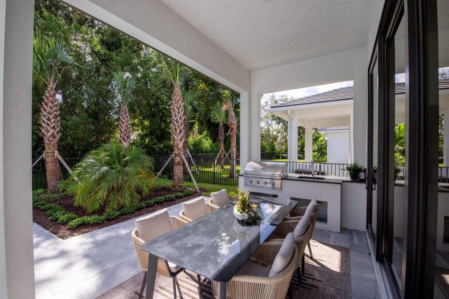 Exterior details and patio area of a home in Symphony at Jupiter, Jupiter (Image 19).