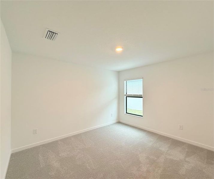 Spacious, unfurnished interior of a new home in The Crossing at Palm River, Tampa (Image 16).