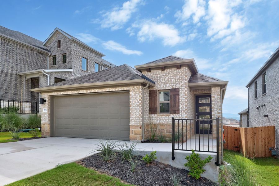 Front exterior of a new home in Lakeside at Tessera, Lago Vista, TX, highlighting curb appeal (Image 18).