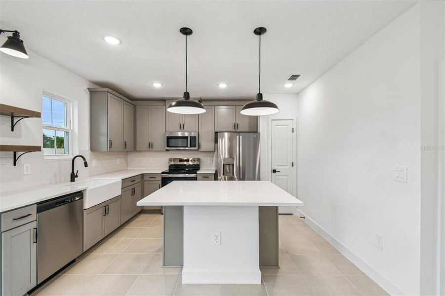 Furnished interior view inside a new home in Aspire at Canter Creek, Davenport (Image 5).