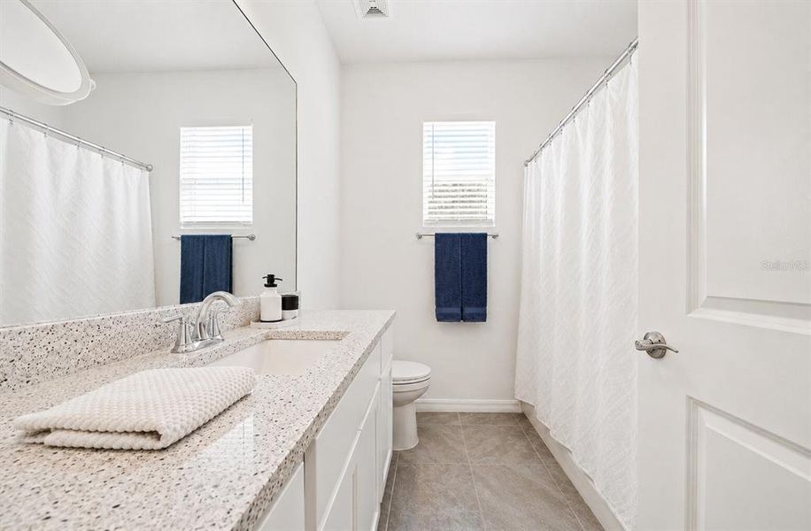 Furnished interior view inside a new home in Towns at Woodsdale Villas, Wesley Chapel (Image 9).