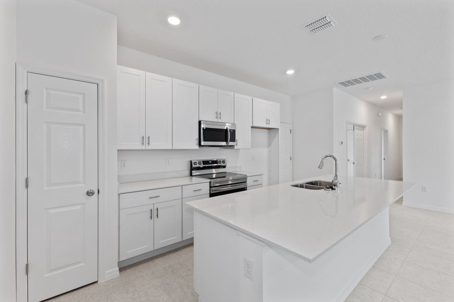 Furnished interior view inside a new home in Mirror Lake Village, Fruitland Park (Image 7).