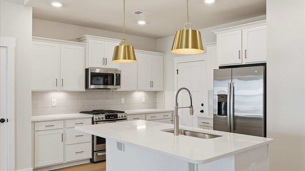 Superior craftsmanship shines in this modern kitchen with a space-saving island and open flow located in Anderson, SC Superior craftsmanship shines in this modern kitchen with a space-saving island and open flow located in Anderson, SC