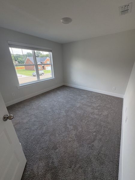 Spacious, unfurnished interior of a new home in Rookers Bend, Smyrna (Image 25).