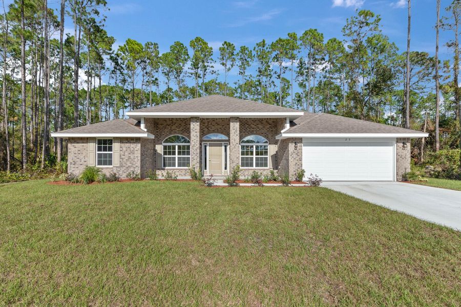 Representative exterior photo of a completed home built from the 2169 by Adams Homes in Lakewood Park, Fort Pierce, FL (Image 17). Representative exterior photo of a completed home built from the 2169 by Adams Homes in Lakewood Park, Fort Pierce, FL (Image 17).