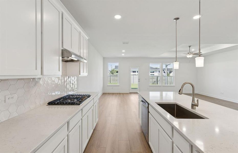 Spacious kitchen with eat-in bartop island