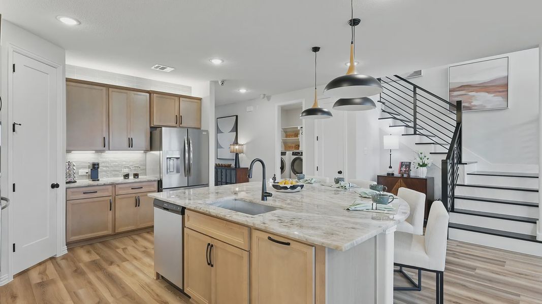 Model home photos of similar floorplans, not pictures of actual home.