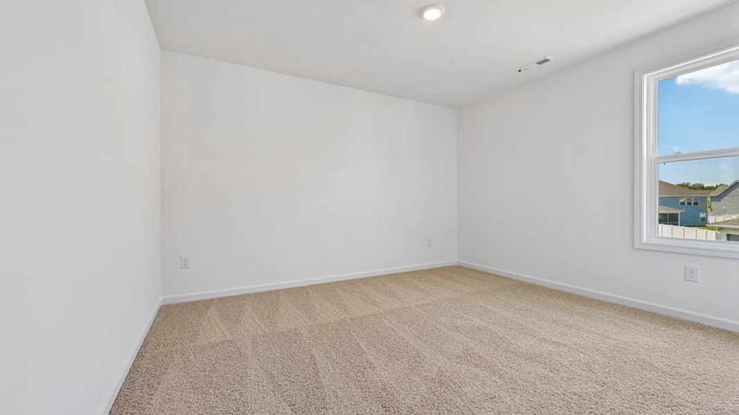 Spacious, unfurnished interior of a new home in Eagle Creek, Fuquay Varina (Image 31).