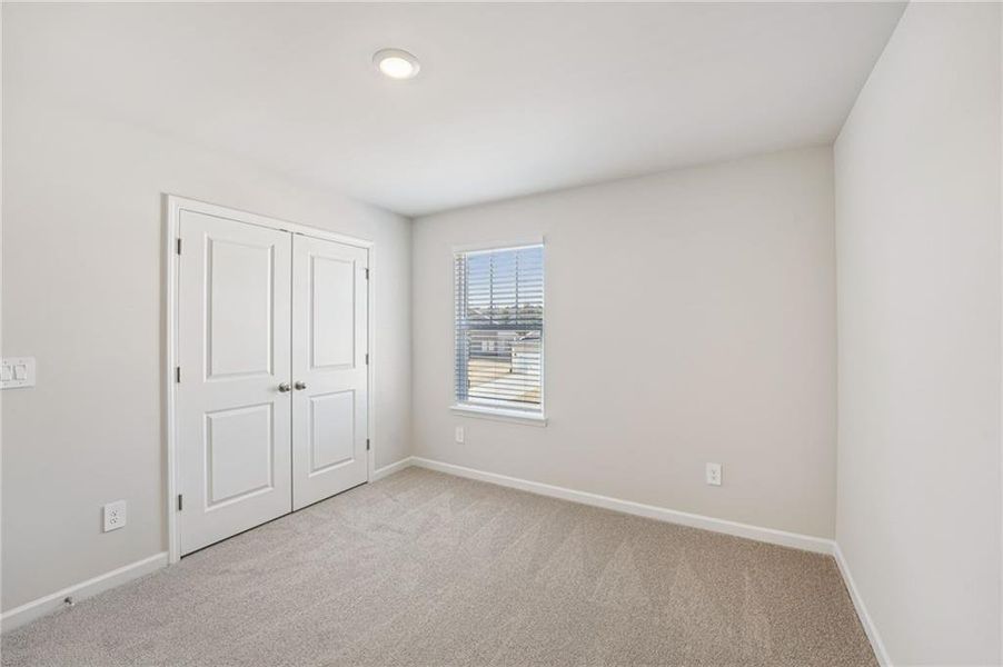 Spacious, unfurnished interior of a new home in Creekside at Oxford Park, Fairburn (Image 34).
