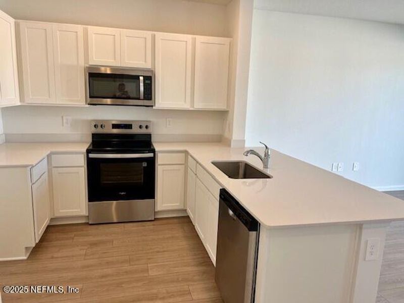 Furnished interior view inside a new home in The Landing, Middleburg (Image 10).