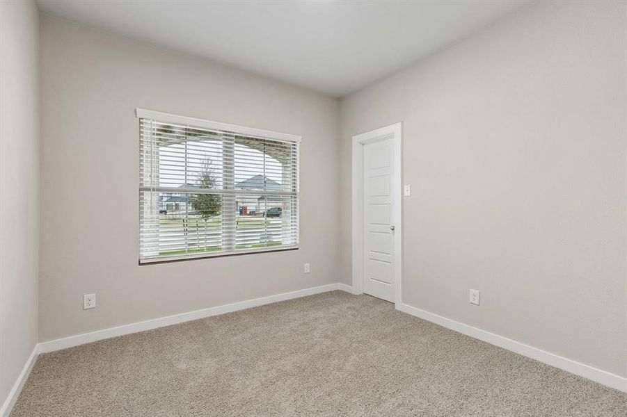 Bedroom in the Emmy II home plan by Trophy Signature Homes - REPRESENTATIVE PHOTO