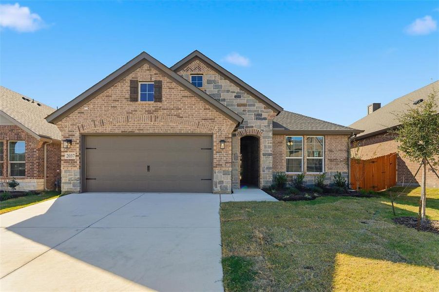 Front exterior of a new home in Northstar, Haslet, TX, highlighting curb appeal (Image 21).