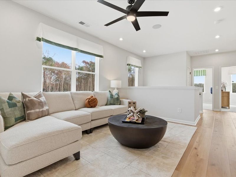 Representative furnished interior of a home built from the Cardinal by Tri Pointe Homes in Ellis Townes, Charlotte (Image 23).