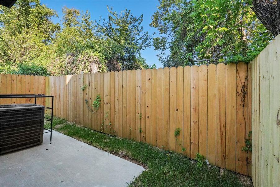 Fenced backyard with a patio Fenced backyard with a patio
