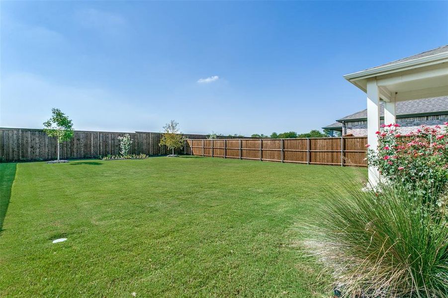 Exterior details and patio area of a home in The Preserve, Justin (Image 3).