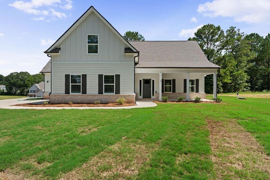 Front exterior of a new home in , McDonough, GA, highlighting curb appeal (Image 16). Front exterior of a new home in , McDonough, GA, highlighting curb appeal (Image 16).